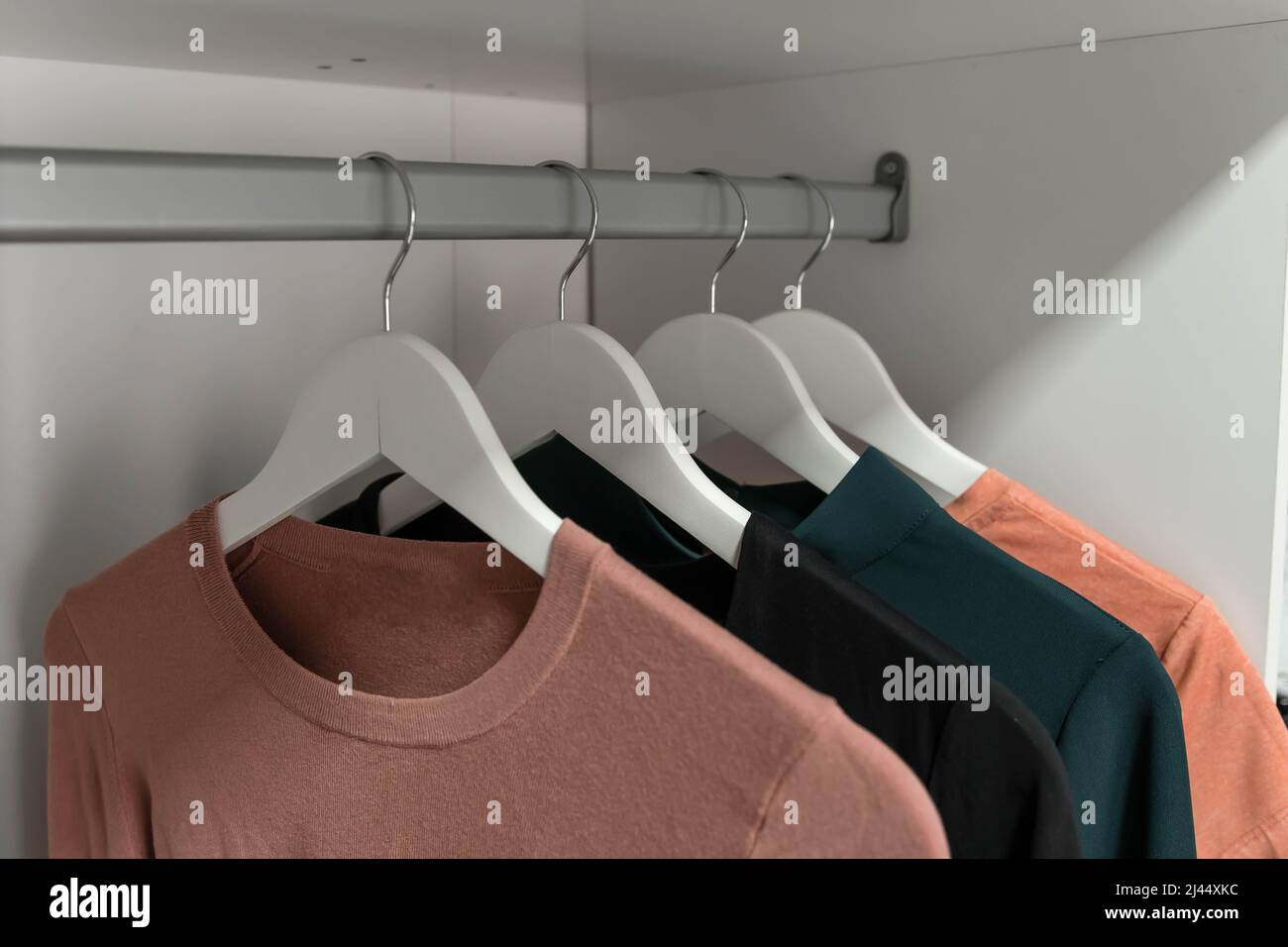 Hangers with clothes. Fashionable clothes on hangers Stock Photo Alamy