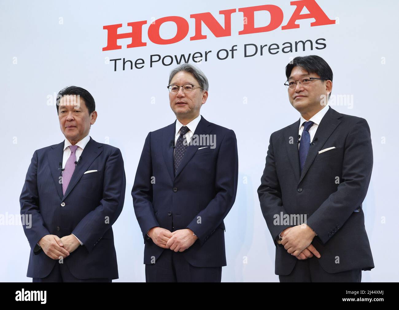 Tokyo, Japan. 12th Apr, 2022. Japan's automobile giant Honda Motor (L-R) senior managing executive officer Shinji Aoyama, president Toshihiro Mibe and executive vice president Kohei Takeuchi pose for photo at a press conference for the company's business strategy of electric vehicles at Honda's headquarters in Tokyo on Tuesday, April 12, 2022. Honda announced the company had plan to launch 30 EV models globally by 2030 with production volume of more than 2 million units annually. Credit: Yoshio Tsunoda/AFLO/Alamy Live News Stock Photo