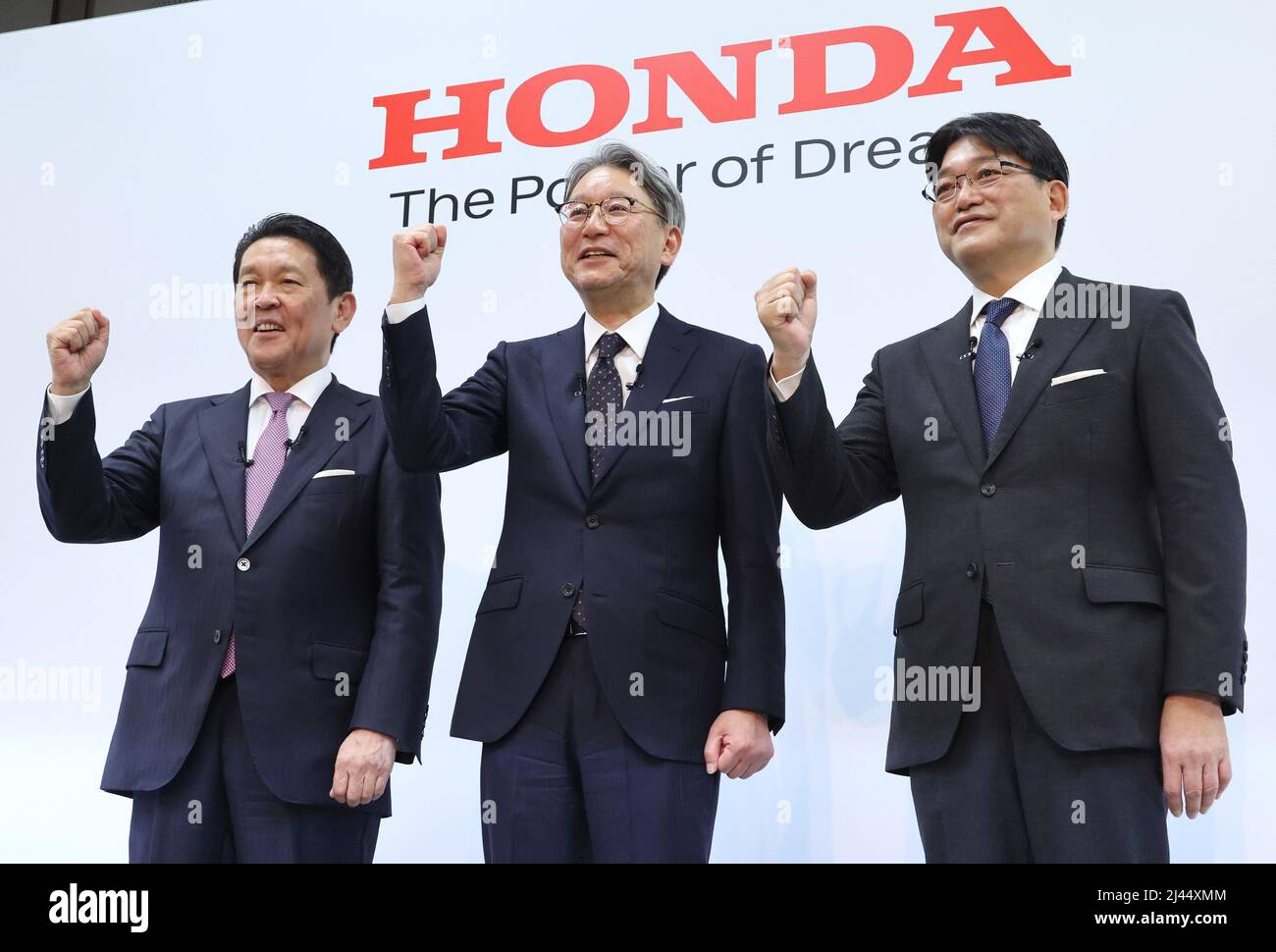 Tokyo, Japan. 12th Apr, 2022. Japan's automobile giant Honda Motor (L-R) senior managing executive officer Shinji Aoyama, president Toshihiro Mibe and executive vice president Kohei Takeuchi pose for photo at a press conference for the company's business strategy of electric vehicles at Honda's headquarters in Tokyo on Tuesday, April 12, 2022. Honda announced the company had plan to launch 30 EV models globally by 2030 with production volume of more than 2 million units annually. Credit: Yoshio Tsunoda/AFLO/Alamy Live News Stock Photo
