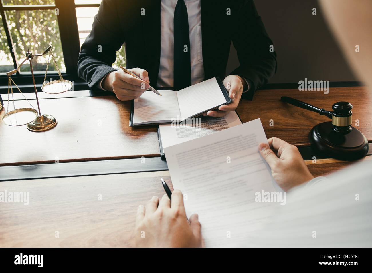 Business lawyer is currently counseling the client's trial at the