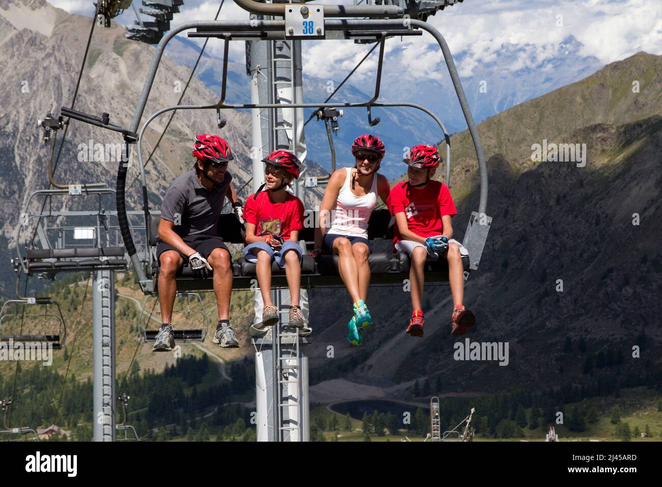 Montgenevre (French Alps, southeastern France) family sitting on a