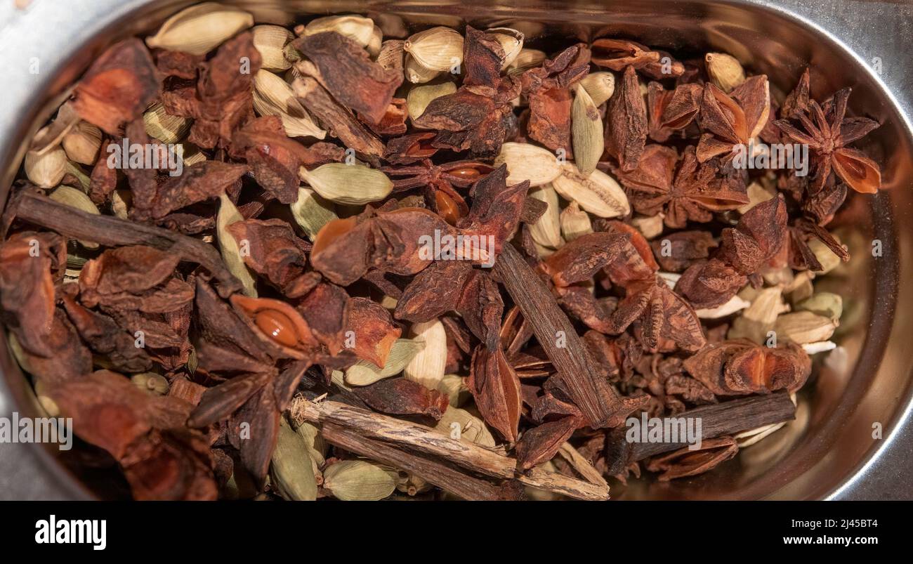 cumin seed vanilla star anise and cardamom spices Stock Photo Alamy