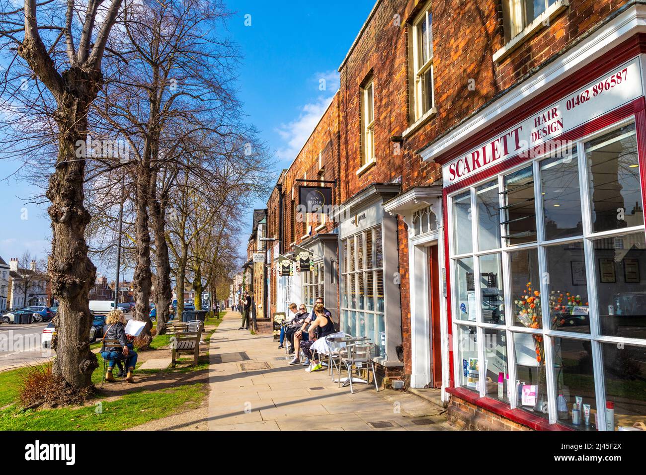 People enjoying a sunny day at Cafe Luna on Baldock High Street