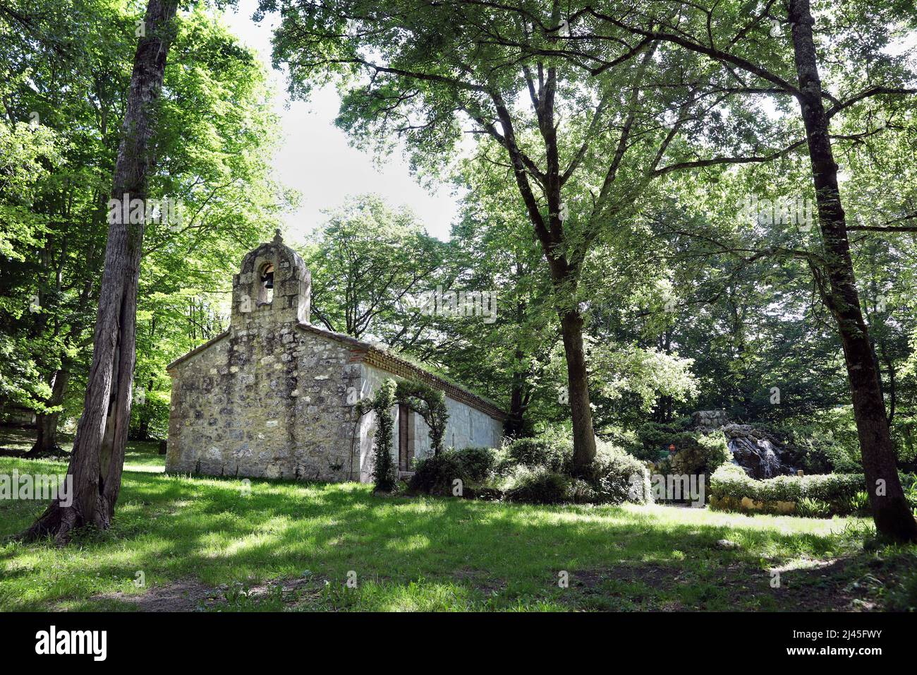Laroque-Timbaut (south-western France): Small Valley of Saint-Germain with the hot spring of Roland and the Chapel of Saint-Germain Stock Photo