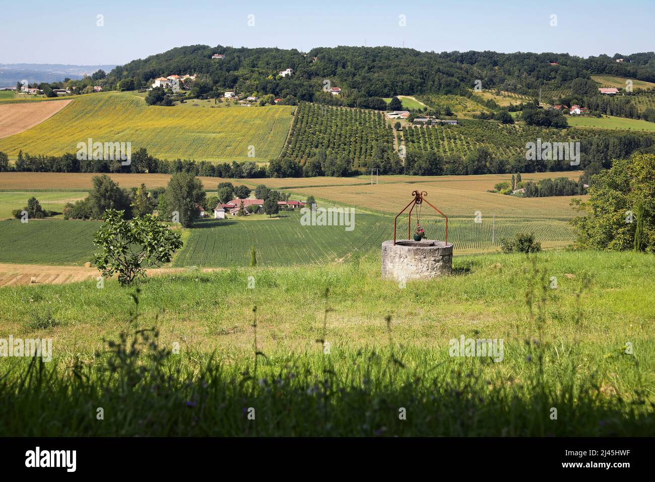 Dolmayrac (south-western France): agricultural landscape with a well viewed from the bastide (fortified medieval town) Stock Photo