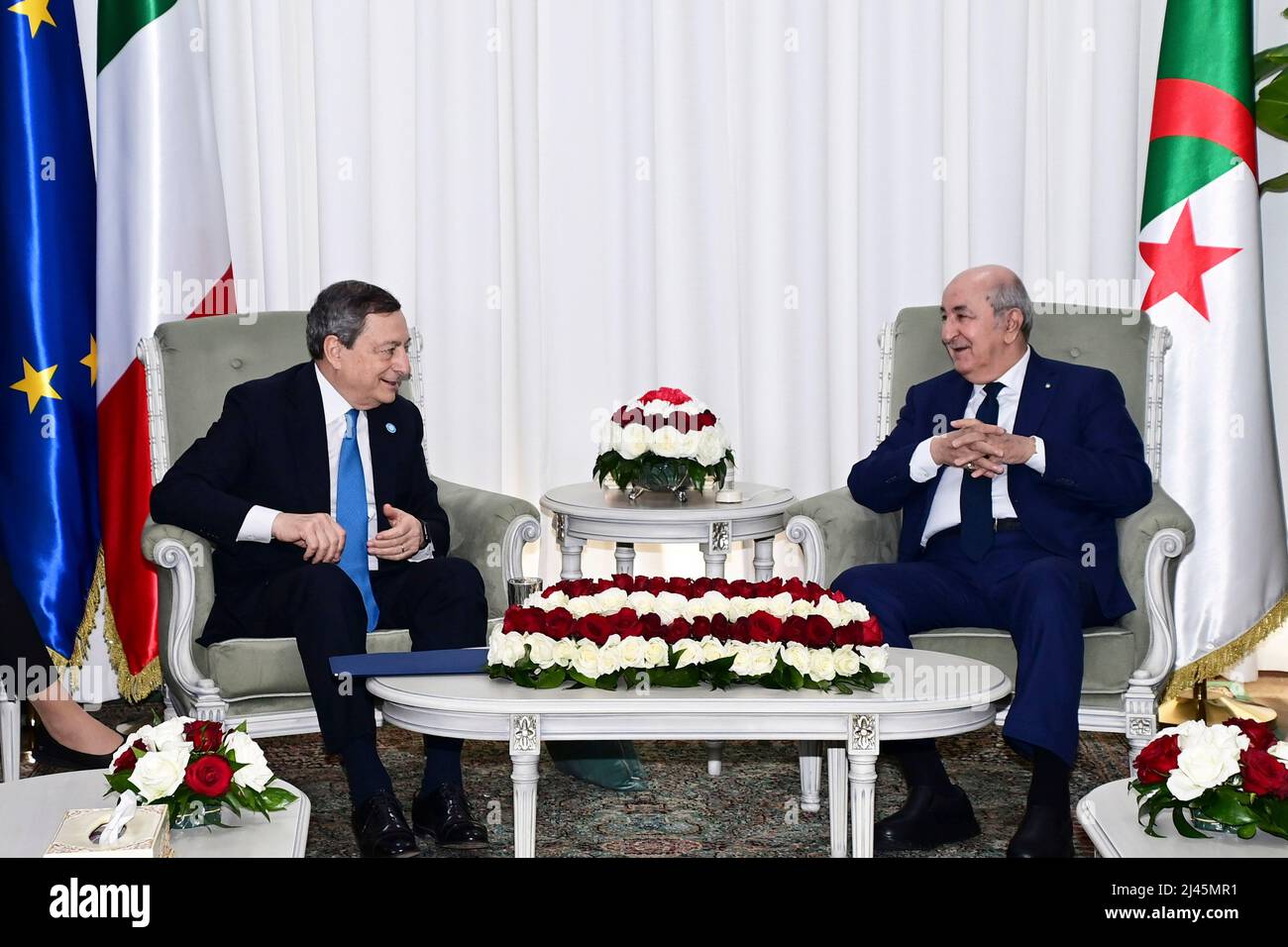 (220412) -- ALGIERS, April 12, 2022 (Xinhua) -- Algerian President Abdelmadjid Tebboune (R) meets with Italian Prime Minister Mario Draghi in Algiers, Algeria, April 11, 2022. Algeria will increase its gas exports to Italy as part of agreements signed between the two sides on Monday to strengthen their energy cooperation, said the Algerian presidency. (Algerian Presidency/Handout via Xinhua) Stock Photo