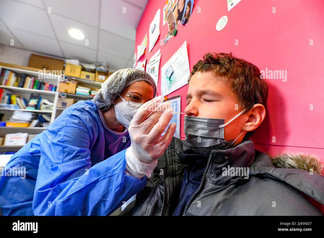 Coronavirus outbreak, Covid-19: antigen test in a pharmacy in Pont-de-l'Arche (northern France) on December 02, 2021. Teenager getting tested for Covi Stock Photo