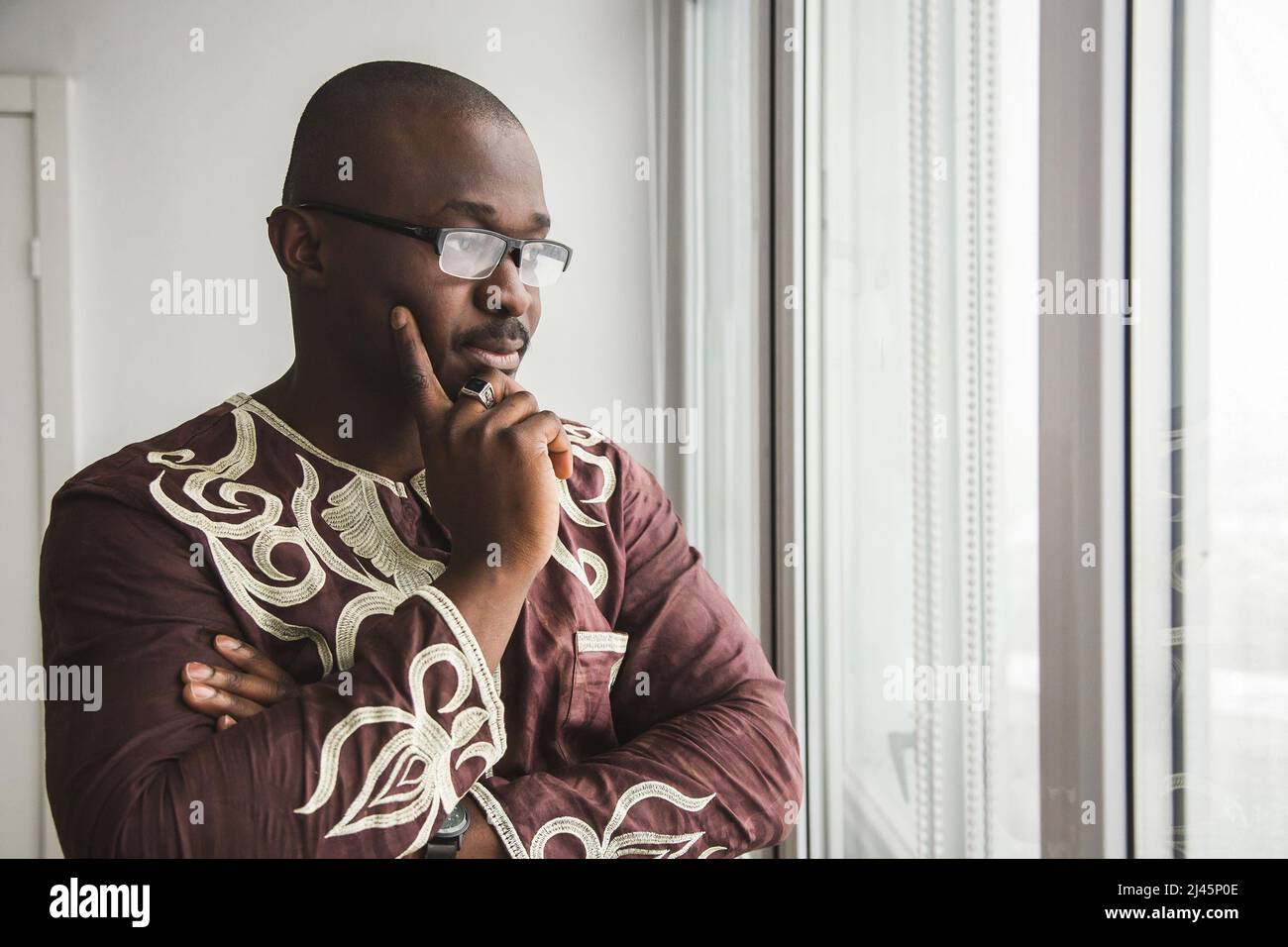 Portrait of an African American in national clothes. Black man posing ...