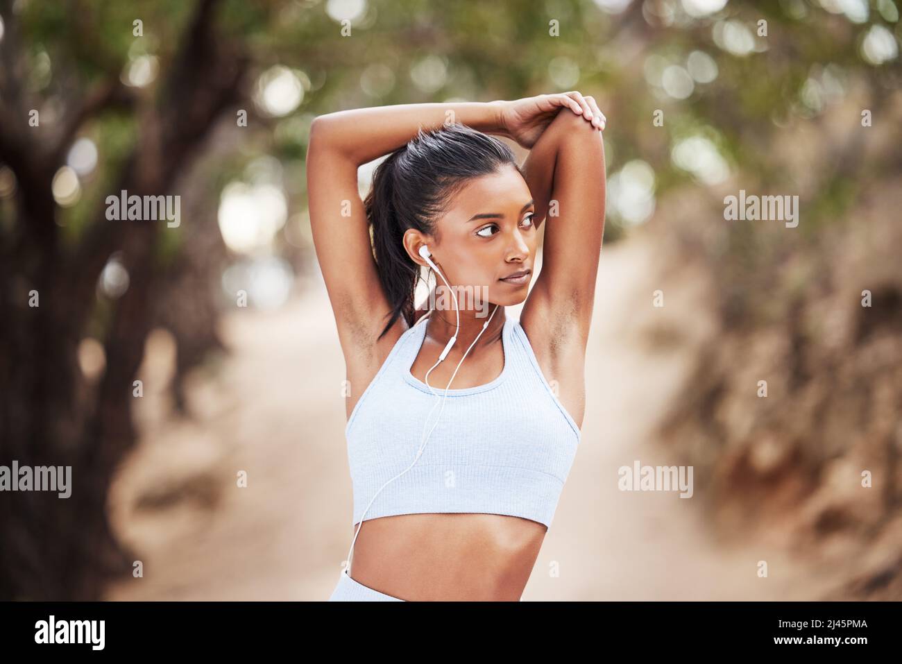 Indian young woman jogging hi-res stock photography and images - Alamy