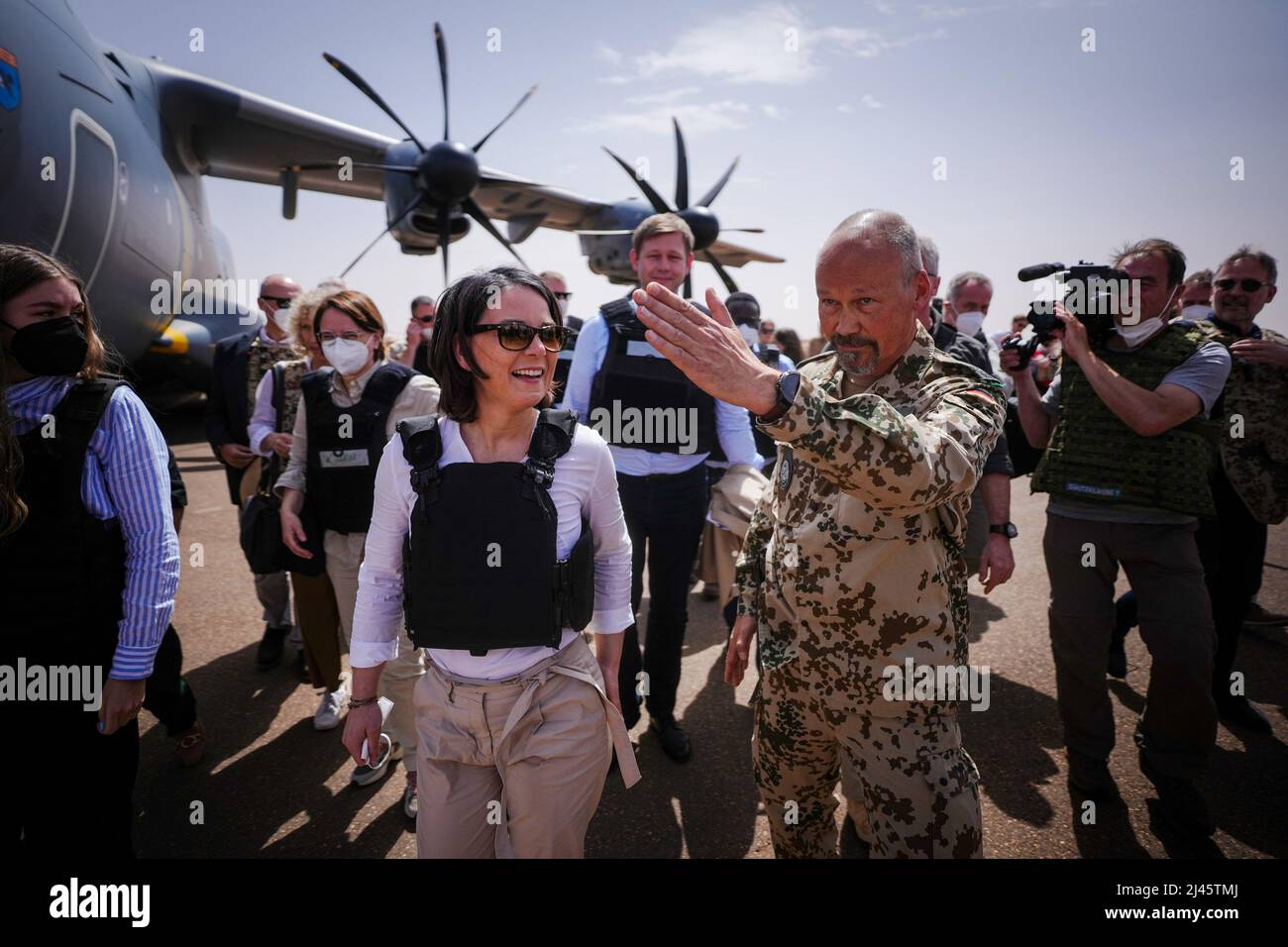 Gao, Mali. 12th Apr, 2022. Annalena Baerbock (Bündnis 90/Die Grünen), Foreign Minister, is greeted by German contingent commander Peter Küpper at the German Air Force's Airbus A400m at Gao airport in Mali's Camp Castor. The Bundeswehr is involved in the UN mission Minusma in the West African country. Credit: Kay Nietfeld/dpa/Alamy Live News Stock Photo