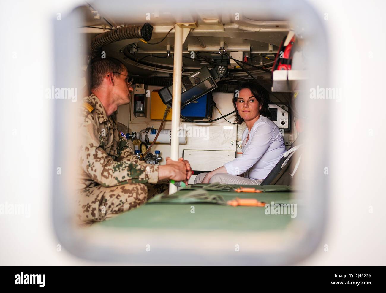 Gao, Mali. 12th Apr, 2022. Annalena Baerbock (Bündnis 90/Die Grünen), foreign minister, sits in a medical fox tank in Gao, Mali, at the Camp Castor field camp. The Bundeswehr is involved in the UN mission Minusma and the EU training mission EUTM in the West African country. Credit: Kay Nietfeld/dpa/Alamy Live News Stock Photo