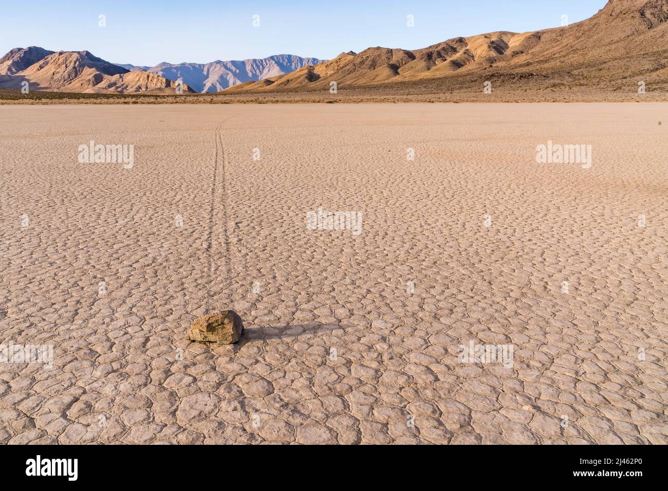 Sailing stones on the Racetrack Playa located in Death Valley National Park, Inyo County, California, U.S. Stock Photo