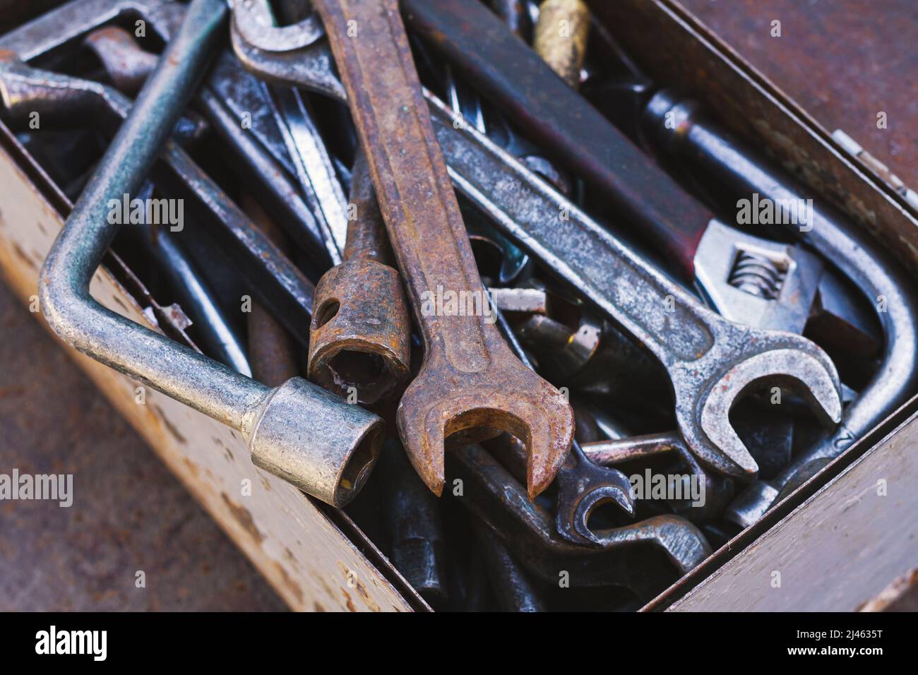 Toolbox of different dirty old hand tools closeup Stock Photo Alamy