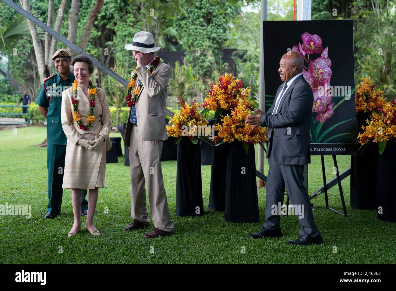 The Princess Royal and Vice Admiral Sir Tim Laurence are shown a photograph of an Orchid named Vanda The Princess Royal during a visit to the Adventure Park PNG in Port Moresby, on day two of the royal trip to Papua New Guinea on behalf of the Queen, in celebration of the Platinum Jubilee. Picture date: Tuesday April 12, 2022. Stock Photo