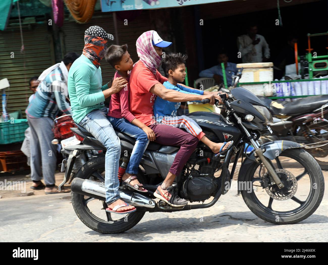 Chanderi Madhya Pradesh, India. 11th Apr, 2022. Bikers on a hot day in Chanderi City, in Chanderi Madhya Pradesh, India on Apr. 11, 2022. (Photo by Ravi Batr/Sipa USA) Credit: Sipa USA/Alamy Live News Stock Photo