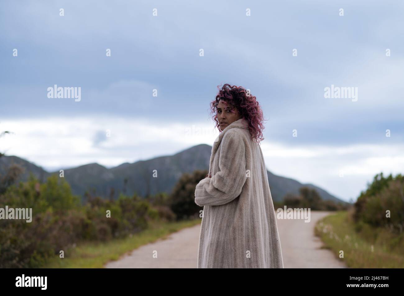 Stylish woman standing vintage hi-res stock photography and images - Alamy