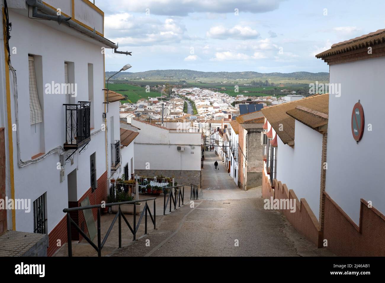 View down one of the steep streets in La Puebla de los Infantes, Seville, Andalucia, Spain Stock Photo