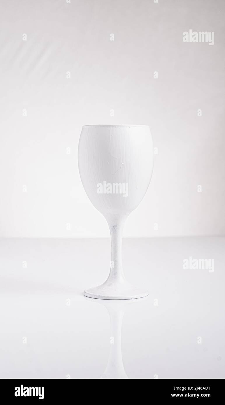 white wine glass in a high key setting Stock Photo