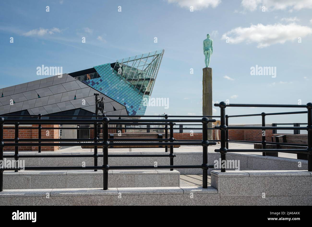 Princess dock with view of Watcher statue and The Deep acquarian as backdrop all under a bright blue sky in spring in Hull, Yorkshire, UK. Stock Photo