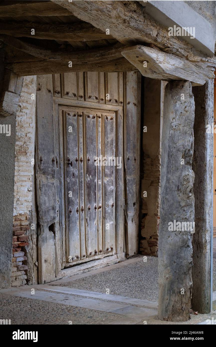 Oak panelled door in Becerril de Campos, Palencia, Castile and León, Spain Stock Photo