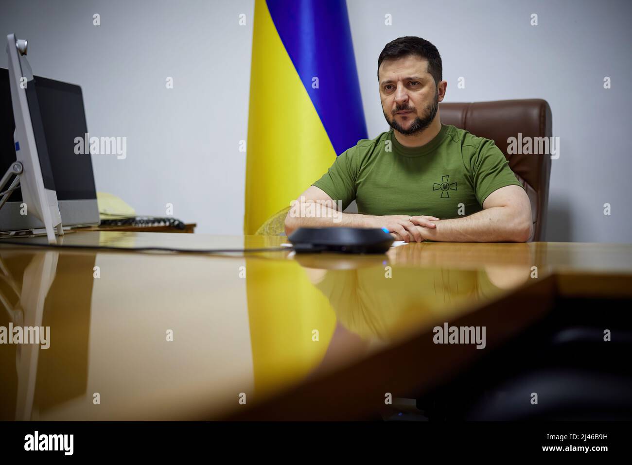The President of Ukraine - Volodymyr Zelensky - addresses the Parliament of Lithuania from his bunker office in Kyiv, Ukraine. Zelensky stated that 'the new package of sanctions should be such that Russia does not even talk about weapons of mass destruction'. Stock Photo