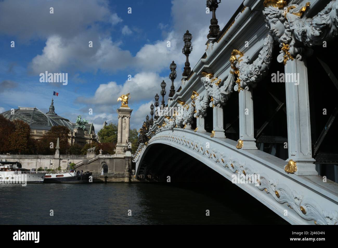 Pont Alexandre III spanning La Seine and connecting the Champs-Élysées  with the Invalides and Eiffel Tower - Paris - France Stock Photo