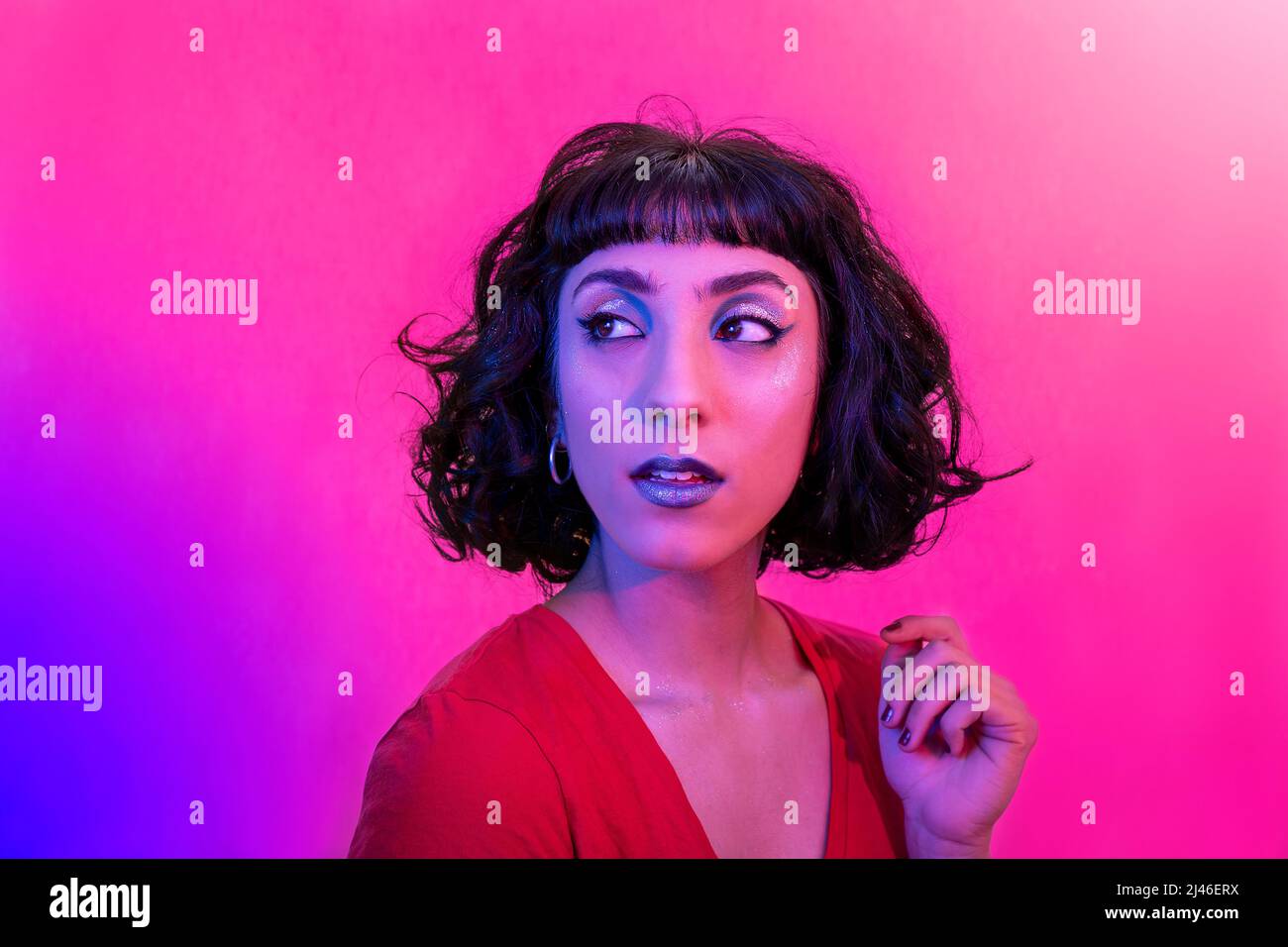 Surprised young female in trendy hi-res stock photography and images ...