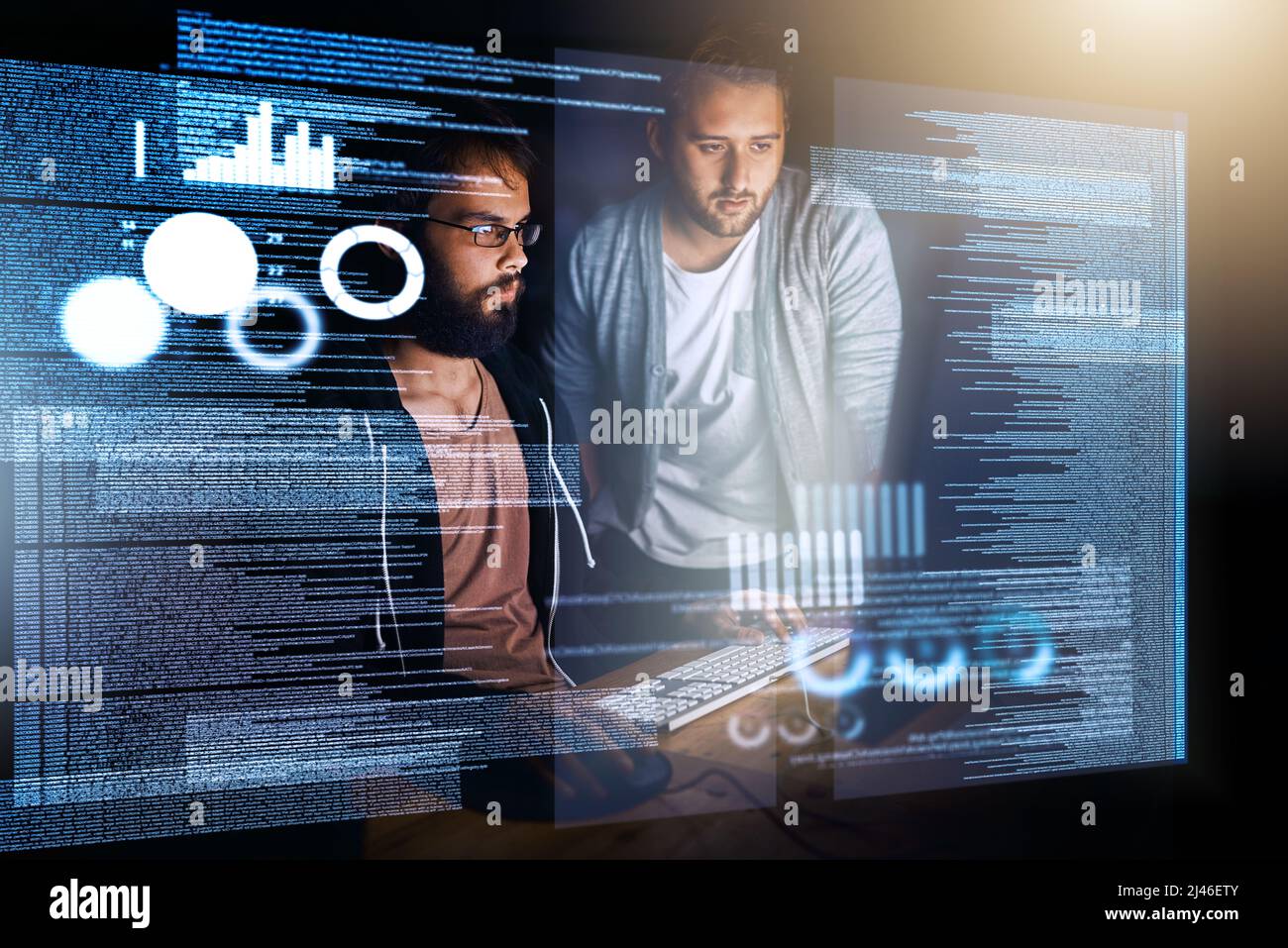Two of the very best. Cropped shot of young computer programmers working on source code. Stock Photo