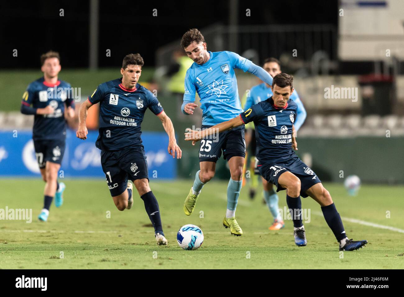 Sydney, Australia. April 12, 2022, Callum Talbot of Sydney FC and Javier Lopez of Adelaide United F.C. compete for the ball during the A-League match between Sydney FC and Adelaide United FC at Netstrata Jubilee Stadium, on April 12, 2022, in Sydney, Australia. Credit: Izhar Ahmed Khan/Alamy Live News/Alamy Live News Stock Photo