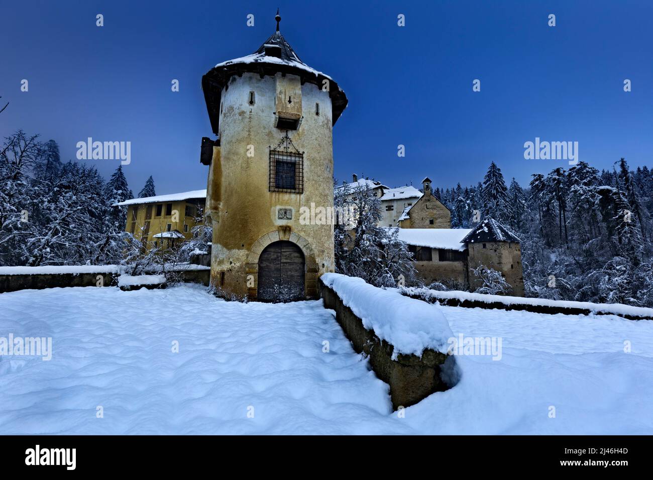 Winter night at Bragher Castle, the picturesque fortress of the Thun dynasty. Predaia, Non Valley, Trentino, Italy, Europe. Stock Photo