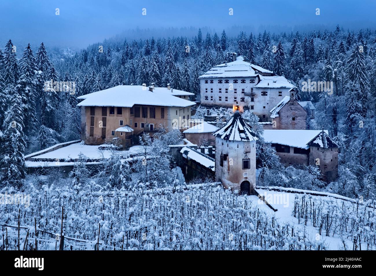 Winter night at Bragher Castle, the picturesque fortress of the Thun dynasty. Predaia, Non Valley, Trentino, Italy, Europe. Stock Photo