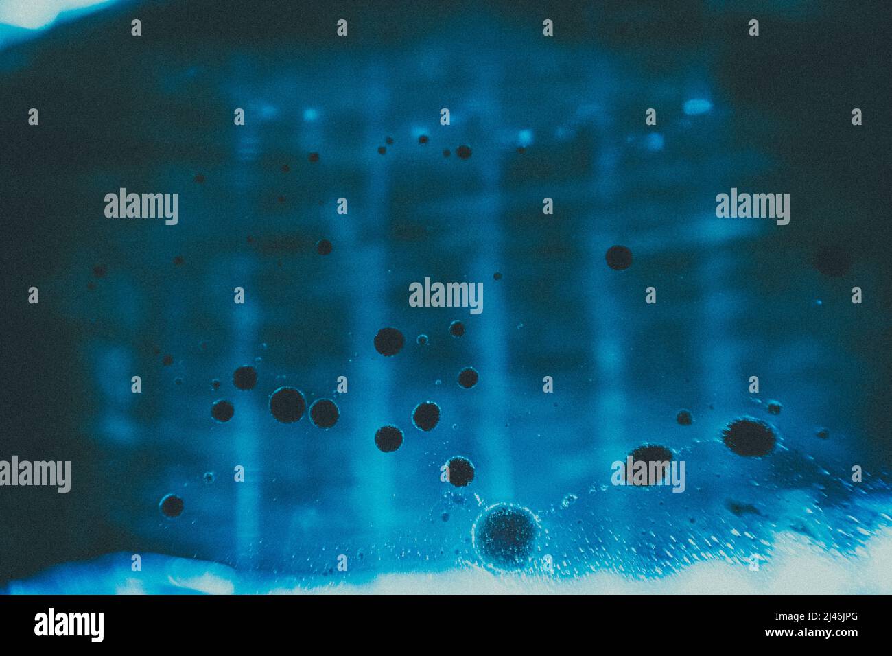 Abstract blue background black splash Stock Photo