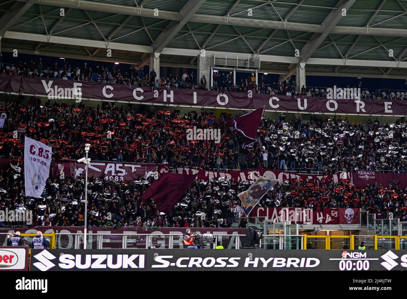 Turin, Italy. 10 April 2022. Fans of Torino FC in sector 'Curva Maratona'  show their support prior to the Serie A football match between Torino FC  and AC Milan. The match ended