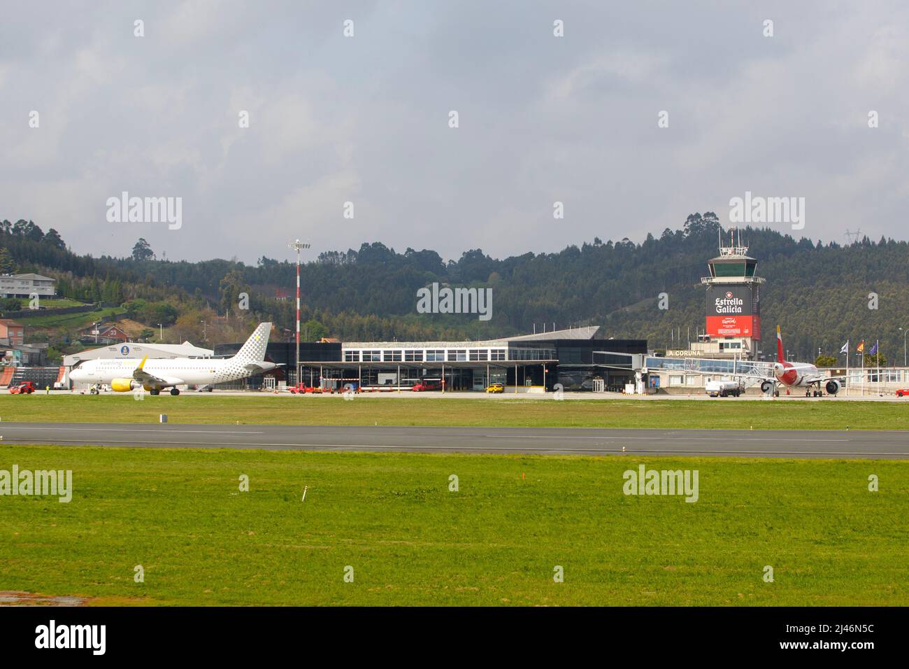 A Coruña-Spain. Alvedro Airport in A Coruña with several passenger planes parked on the runway as of March 30, 2022 Stock Photo
