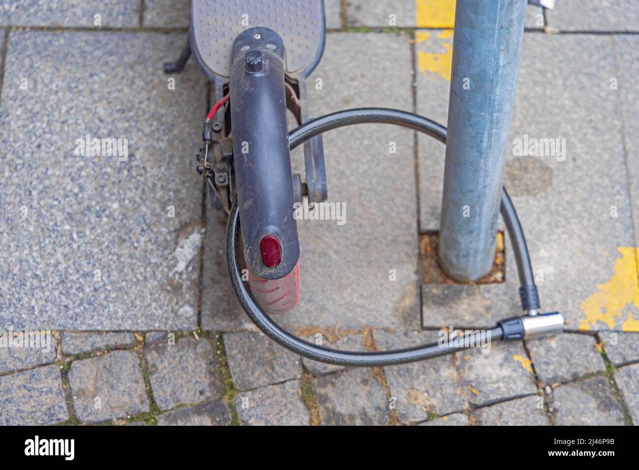 Anti Theft Electric Scooter Back Wheel Locked Stock Photo Alamy