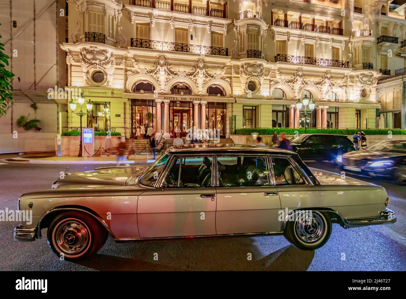 Monaco, Monte Carlo, 21 August 2019: Vintage Mercedes Benz car near the hotel Paris with night illumination, lights of the place Casino Stock Photo