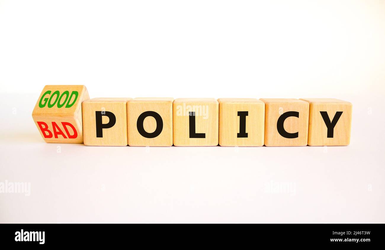 Good or bad policy symbol. Turned wooden cubes and changed concept ...