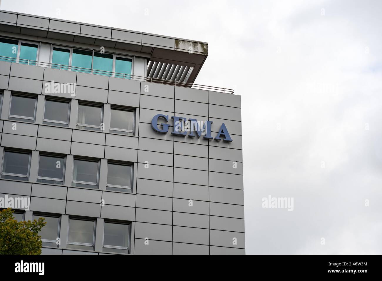 The GEMA logo on a building facade in Berlin. It is a management organisation that claims and collects money for artists and musicians in Germany. Stock Photo