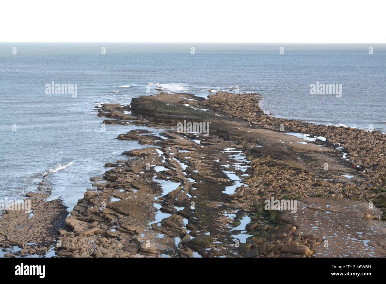 Filey Brigg On A Calm Peaceful Day - Blue Sky - Tourist Destination + Holiday Resort In North Yorkshire - UK Stock Photo