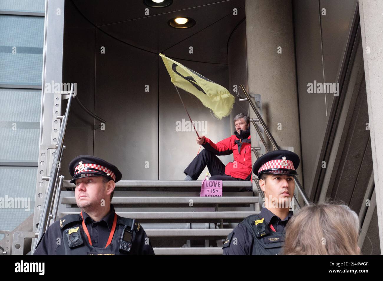 London, UK. 12th Apr, 2022. 40 Extinction Rebellion (XR) activists blocked all entrances to Lloyds of London, shutting the building for the day. Lloyd's of London insures 40% of the world's coal, oil and gas projects. XR is demanding they stop insuring fossil fuels. Today was part of a week long wave of protests and civil disobedience actions to demand an immediate stop to all new fossil fuel infrastructure by the British government amid the climate crisis and ecological emergency. Stock Photo