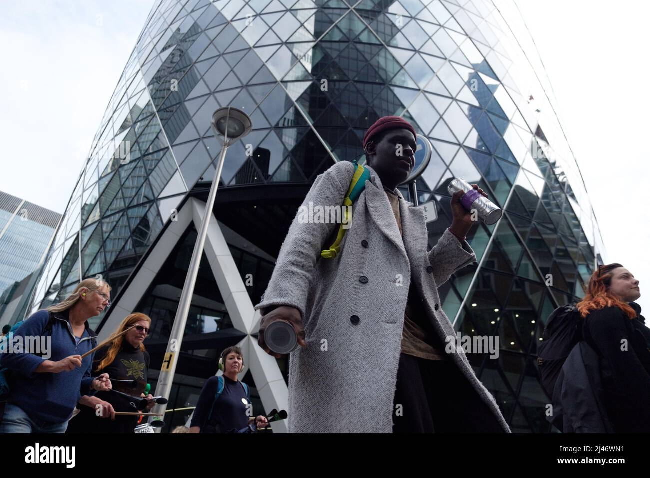 London, UK. 12th Apr, 2022. 40 Extinction Rebellion (XR) activists blocked all entrances to Lloyds of London, shutting the building for the day. Lloyd's of London insures 40% of the world's coal, oil and gas projects. XR is demanding they stop insuring fossil fuels. Today was part of a week long wave of protests and civil disobedience actions to demand an immediate stop to all new fossil fuel infrastructure by the British government amid the climate crisis and ecological emergency. Stock Photo