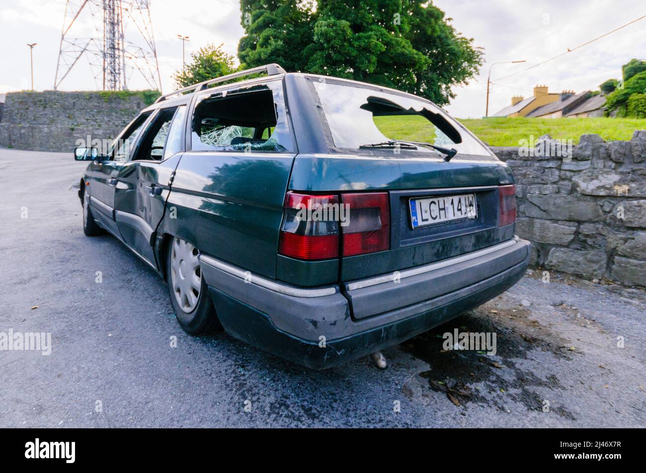Ballinrobe, County Mayo, Republic of Ireland. 1st July 2008. A car belonging to a Polish family is smashed up in a racist attack. Stock Photo