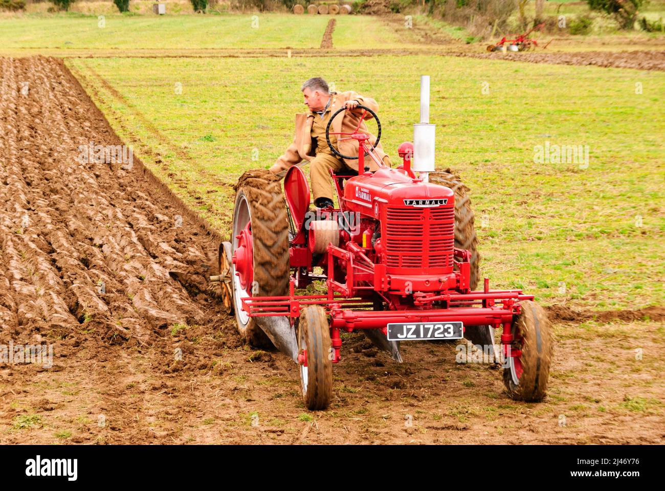 Gilford, Northern Ireland. 23rd February 2008. A farmer drives a