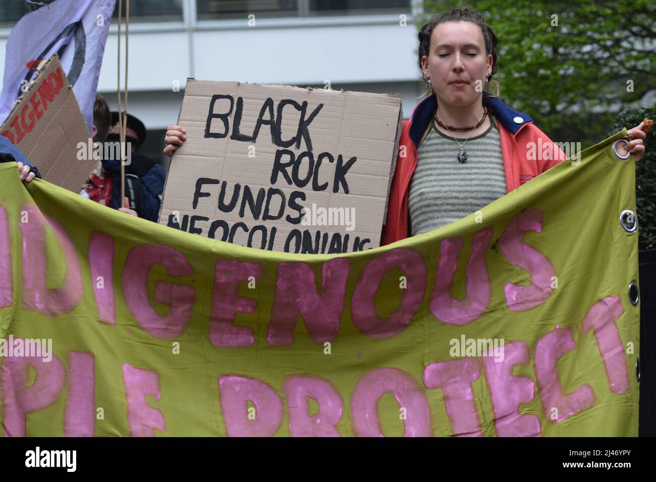 the climate activists xr  group took to the black rock hq following through to block london city roads 'Our reliance on fossil fuels is funding wars, Stock Photo