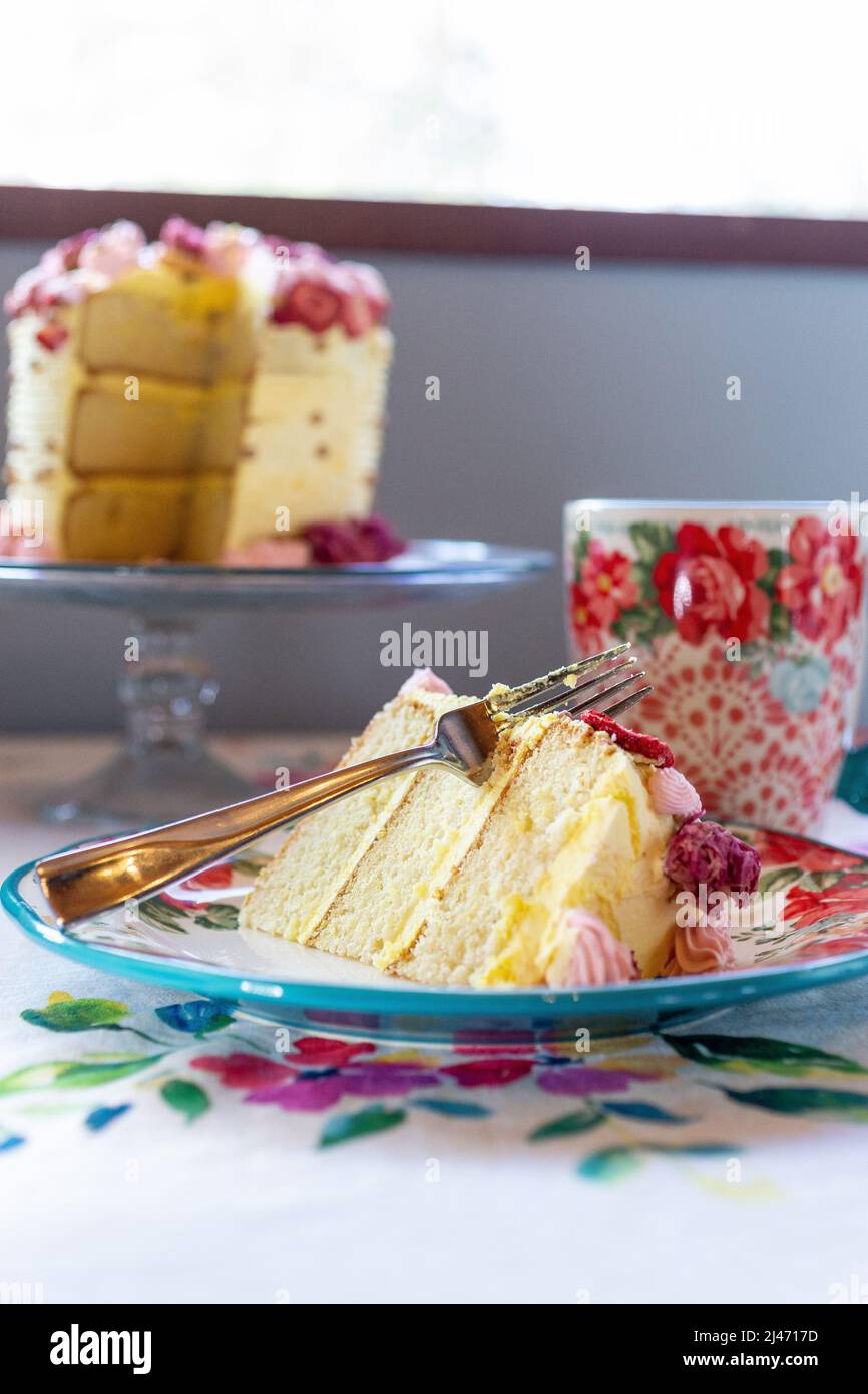 Slice of cake with slice cut out of it hires stock photography and