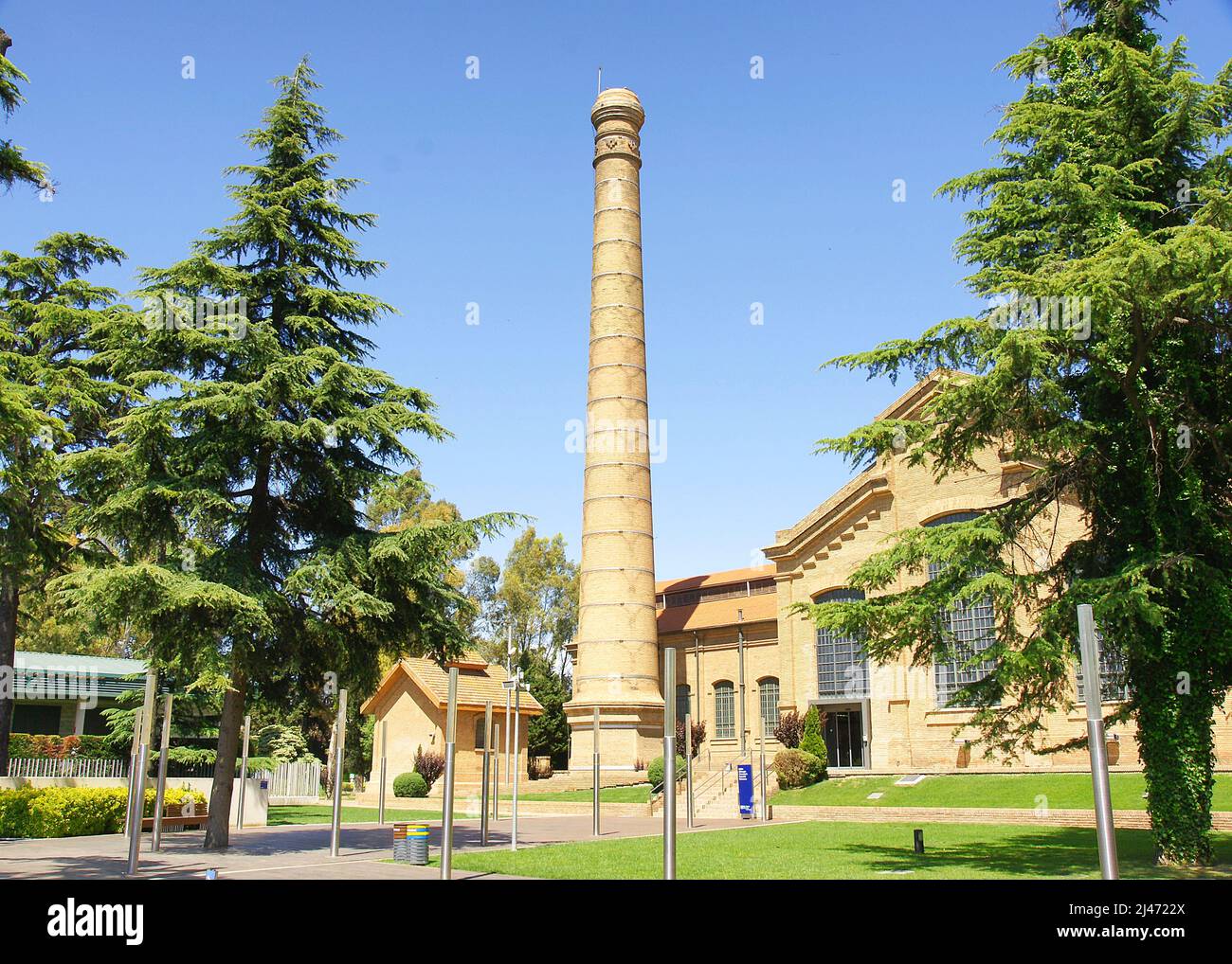 Gardens with old ornamental chimney at the Cornellá de Llobregat Water Museum, Barcelona, Catalunya, Spain, Europe Stock Photo