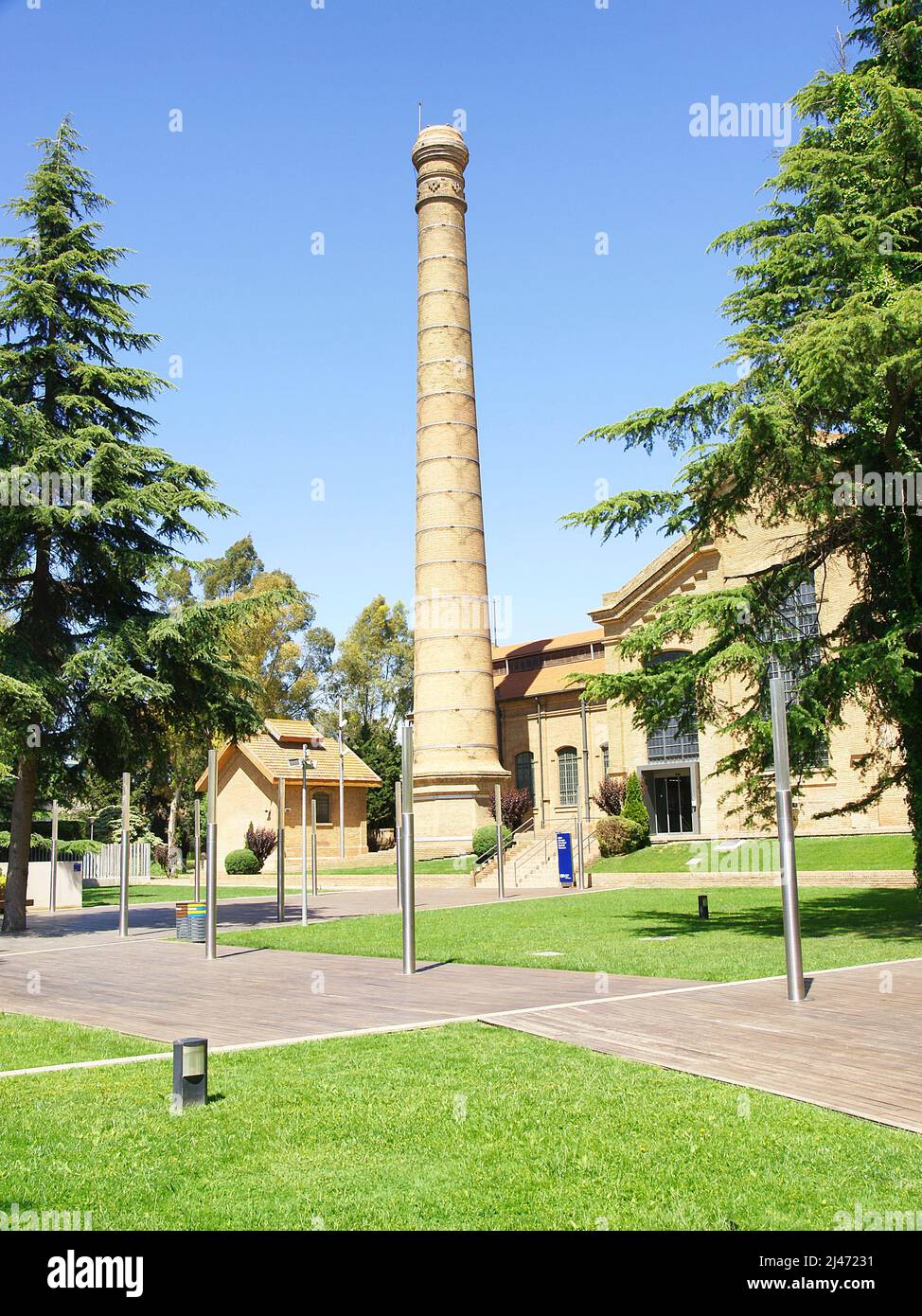Gardens with old ornamental chimney at the Cornellá de Llobregat Water Museum, Barcelona, Catalunya, Spain, Europe Stock Photo