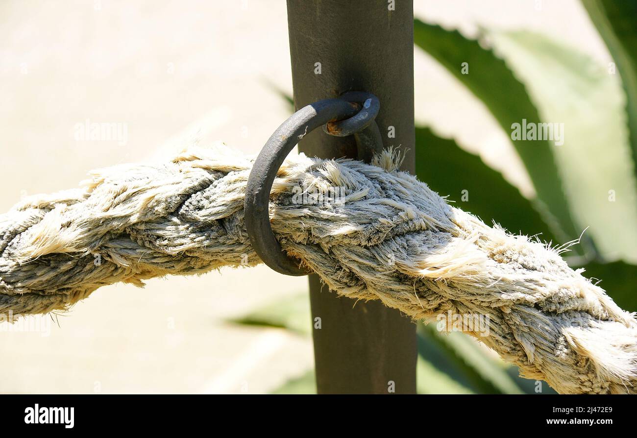 Rope cord detail for funds of the architectural complex of the Bodegas Guell in El Garraf, Barcelona, Catalunya, Spain, Europe Stock Photo