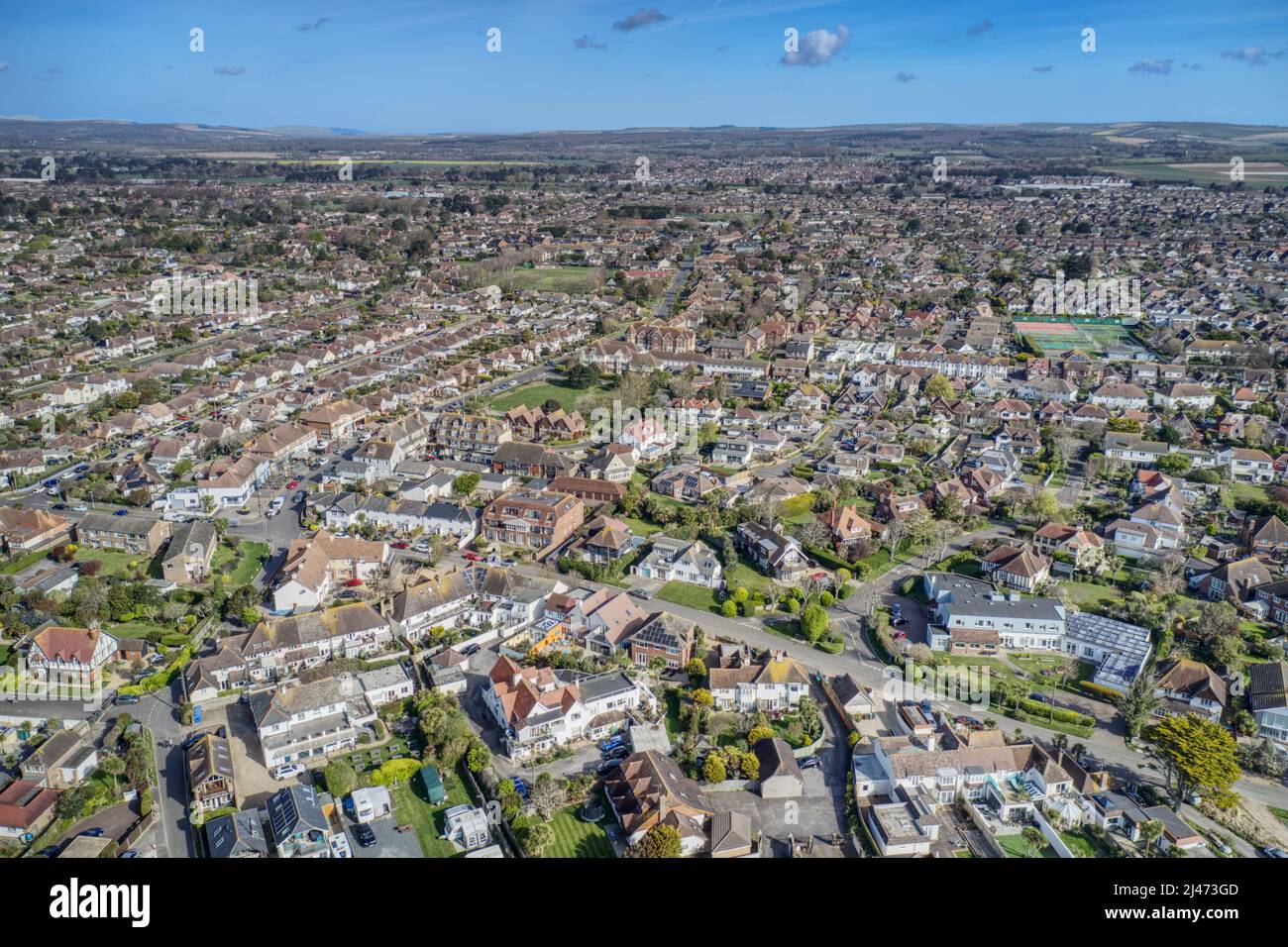 Aerial view of East Preston Village and Angmering on Sea with the South Downs in the background. Stock Photo
