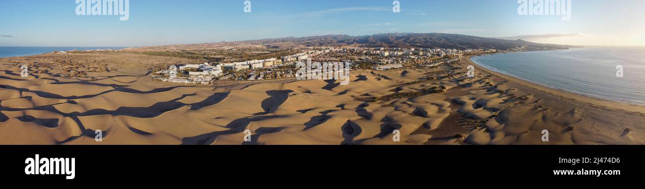 Aerial drone landscape of Maspalomas golden sand dunes at sunrise, Gran Canaria, Canary Islands, Spain Stock Photo